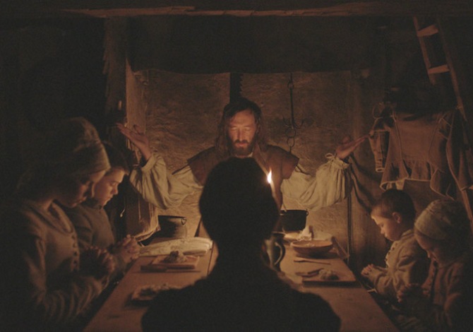 The VVitch - property of Parts and Labor et al. - William praying with his family - from http://www.indiewire.com/2015/01/sundance-review-the-exquisite-holy-terror-of-the-witch-will-chill-your-bones-haunt-your-soul-267876/